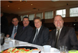Four Men Smiling for Camera