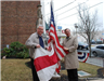 Men Posing with Flag for Picture