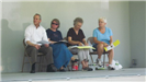 People Sitting on Stage