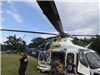 People Taking Pictures by Helicopter