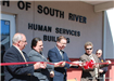 Representatives Cutting the Ribbon