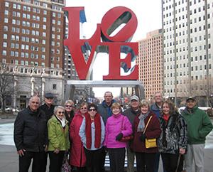Seniors in Front of Love Sign in Philadelphia