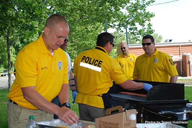 Police Making Food for Attendees (2)